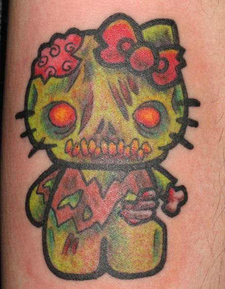 Pictures Of Hello Kitty Tattoos. hello kitty zomibe tattoo done