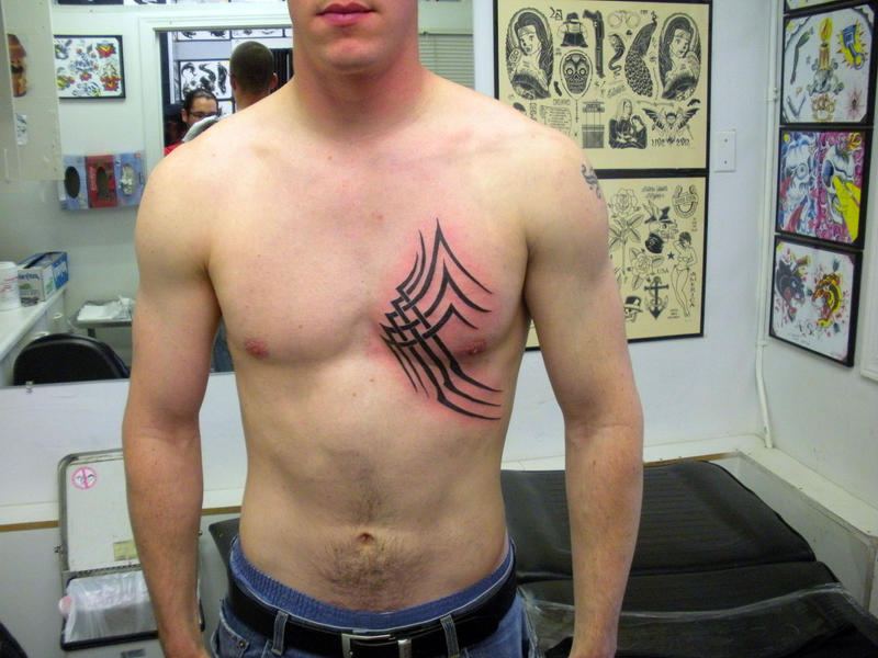 Chest Tribal - chest tattoo