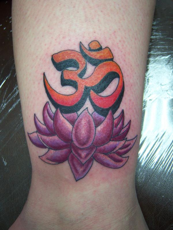 Lotus and Symbol Tattoo by lotus tattoo