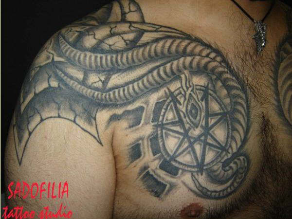 chest tattoo designs. Chest Tattoos. The designs of