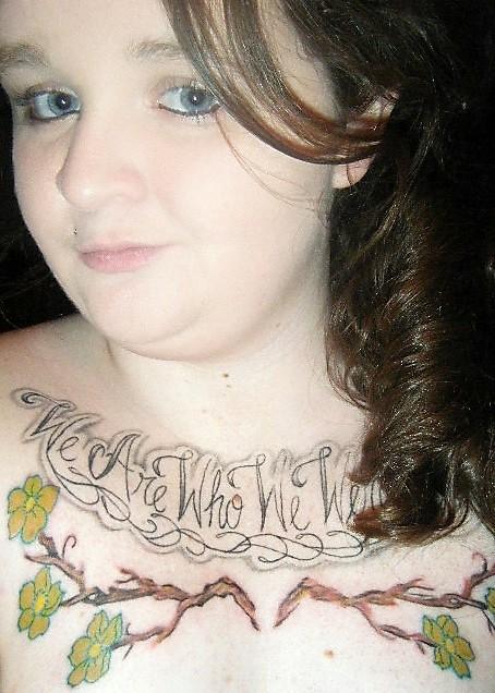 flowers tattoos on chest. flowers tattoos on chest.