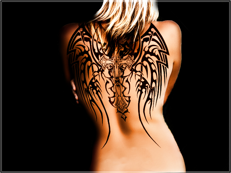cross tattoos with wings on back. Lisa cross and wings tattoo.