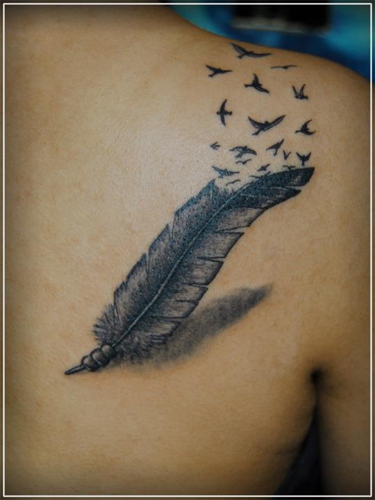 Upper Back Bird Crow Feather Tattoo Picture 3