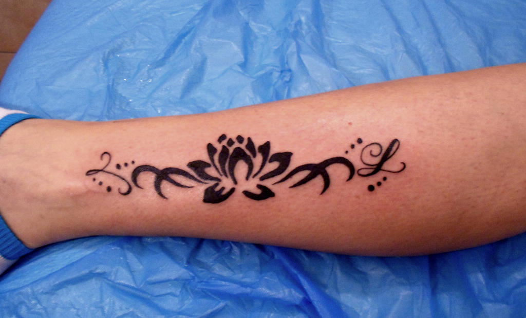 Tribal Lotus Flower Tattoo
