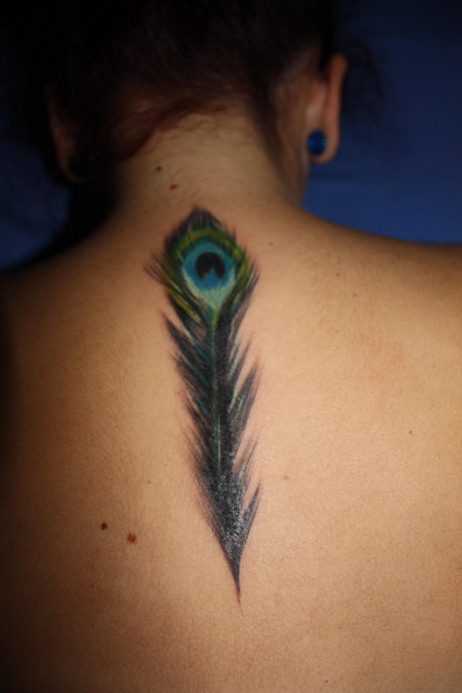peacock feather tattoo by