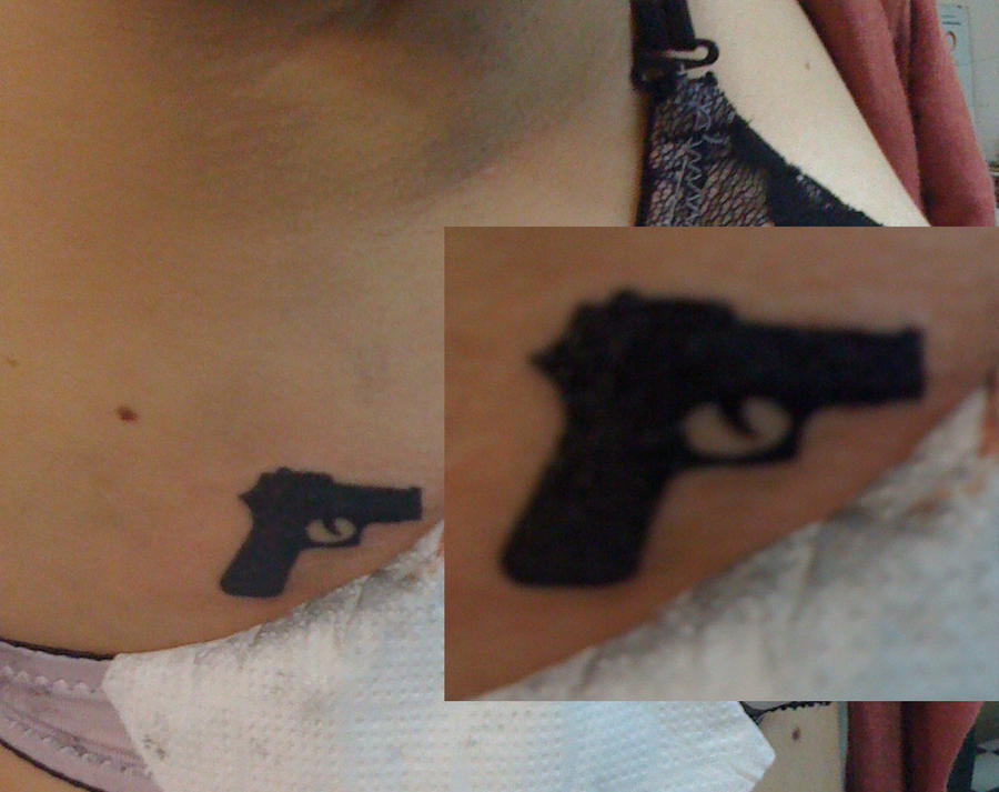 rihanna gun tattoo. gun tattoos. Rihanna#39;s gun