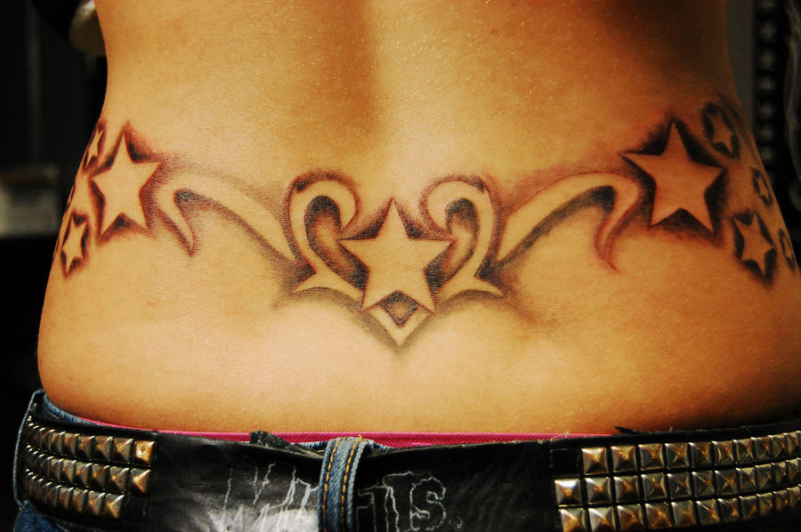 Women Tattoos With Lower Back Star Tattoo Designs